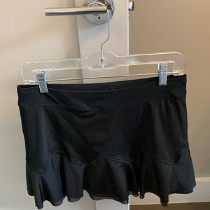 Black flowy tennis skirt with built-in shorts